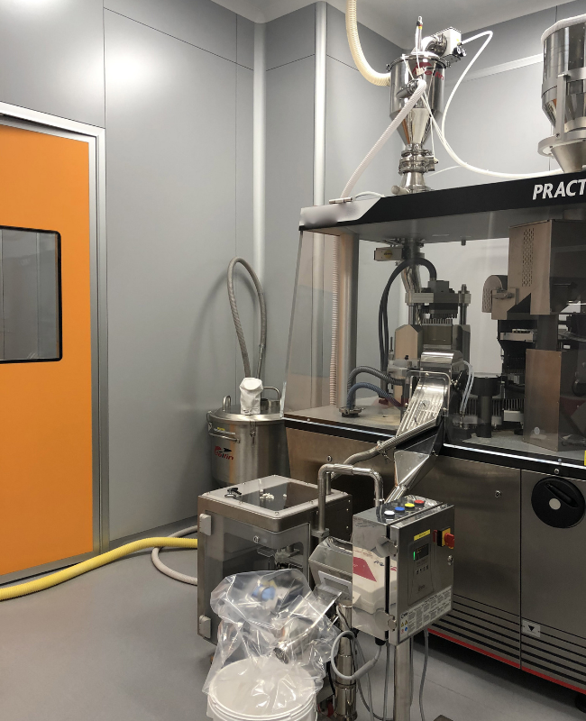 Carico capsulatrice per industria farmaceutica - soluzione Delfin Pneumatic Conveyors
