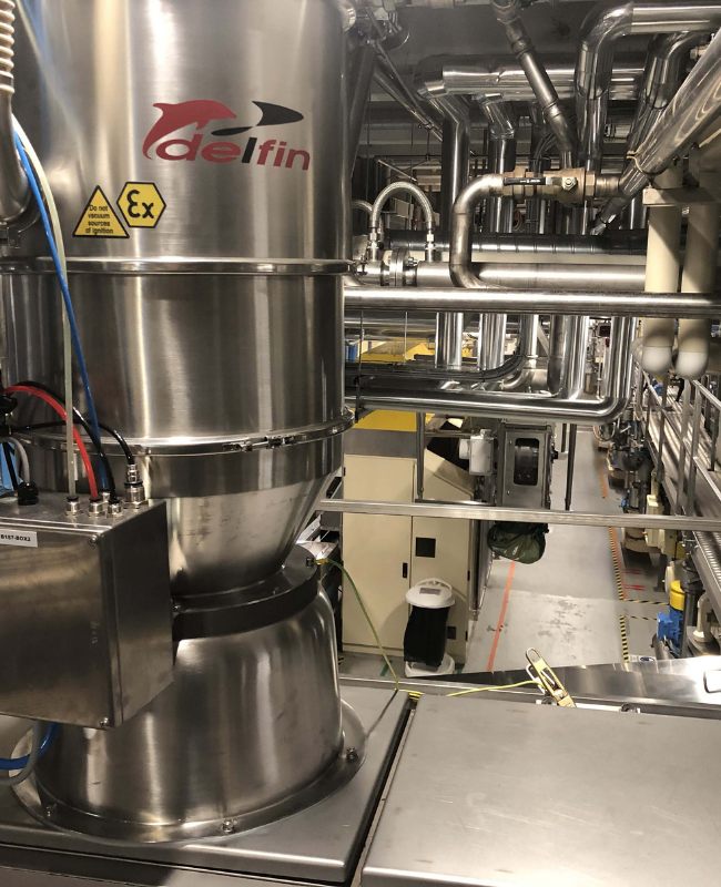Loading and unloading of cocoa mixer - Delfin Pneumatic Conveyors solution