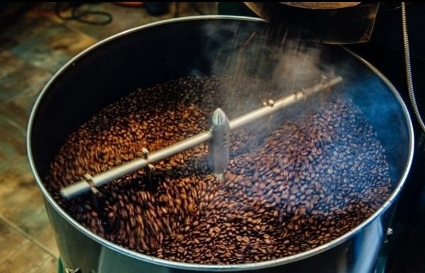 Loading raw coffee into the roaster with Delfin Pneumatic Conveyors